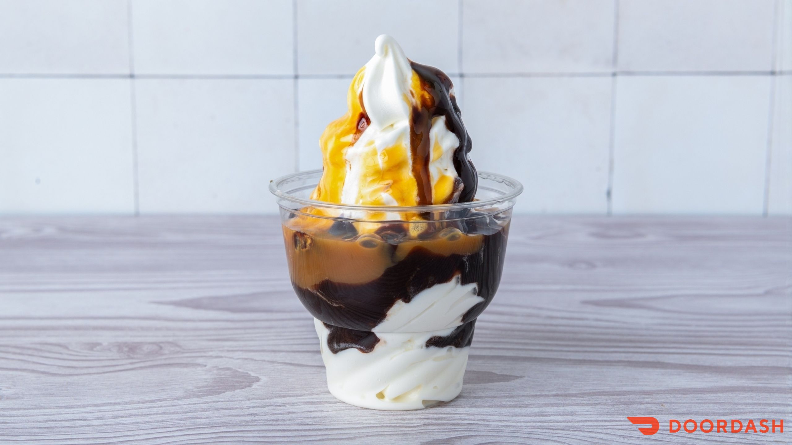 Hot fudge sundae topped with whipped cream