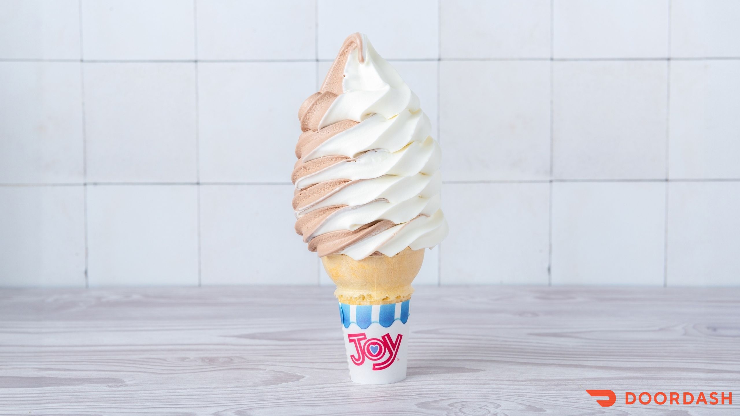 Chocolate and vanilla swirl soft serve cone