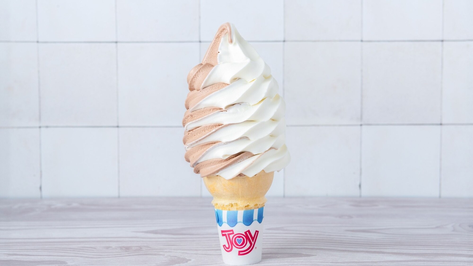 Chocolate and vanilla swirl soft serve cone